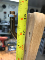 Checking height measurement for mounting finished lamp assembly.