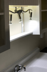 Custom kitchen over-sink lighting fixture, created from recycled components.